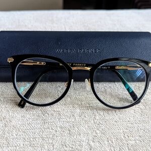 Warby Parker Black and Gold Round Glasses